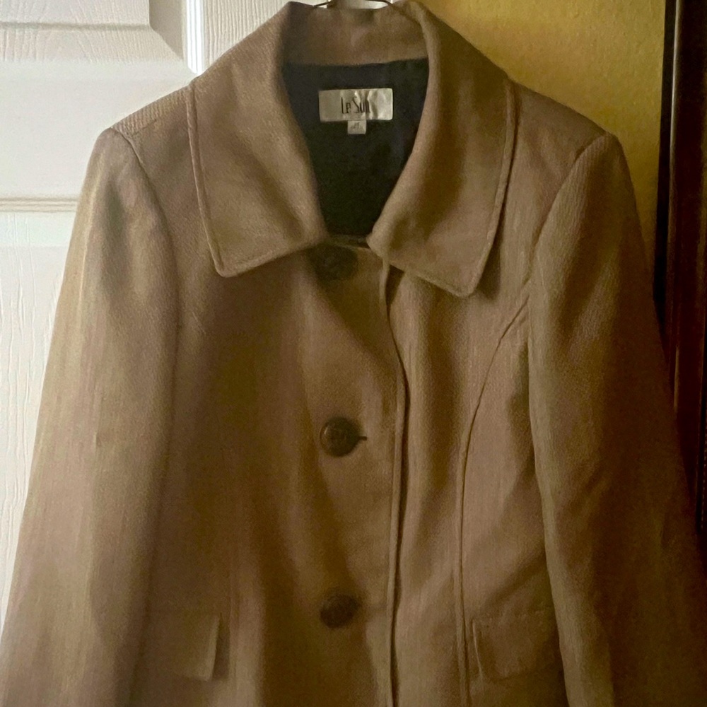 Tan pantsuit jacket with black pants